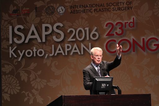 Dr. Grotting lecturing to a very large audience in Kyoto, Japan, at the International Society of Aesthetic Plastic Surgery.