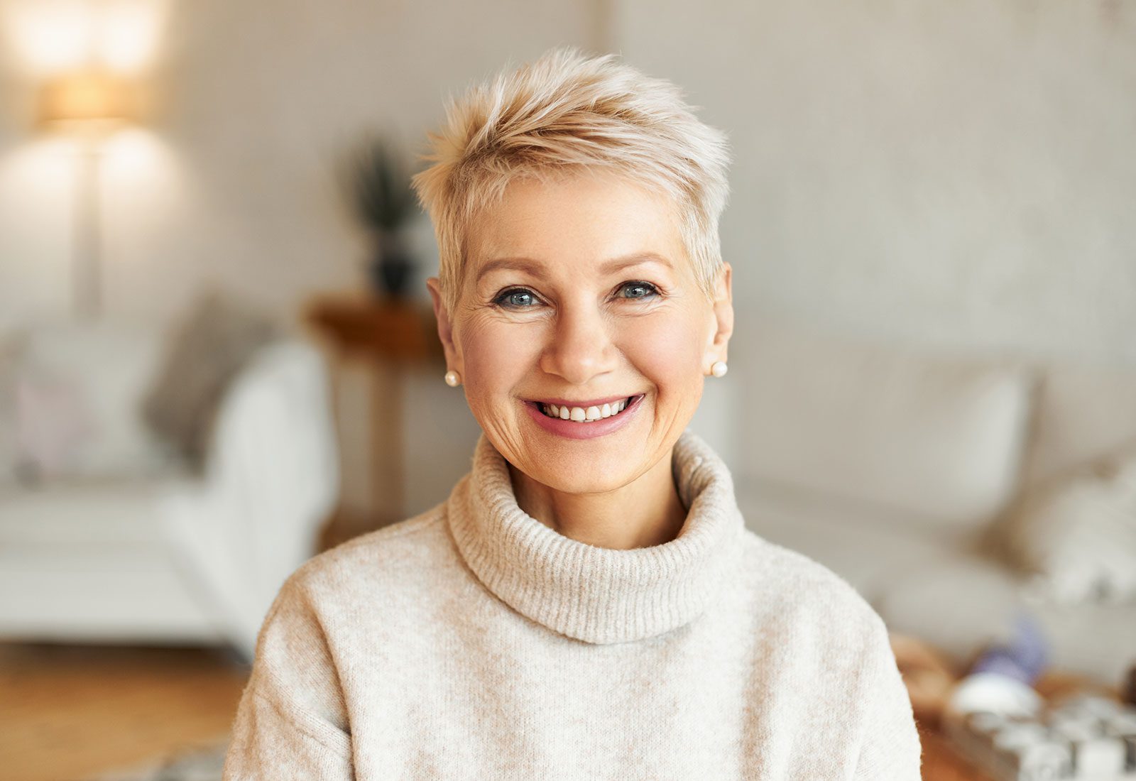 Smiling middle aged woman with short hair