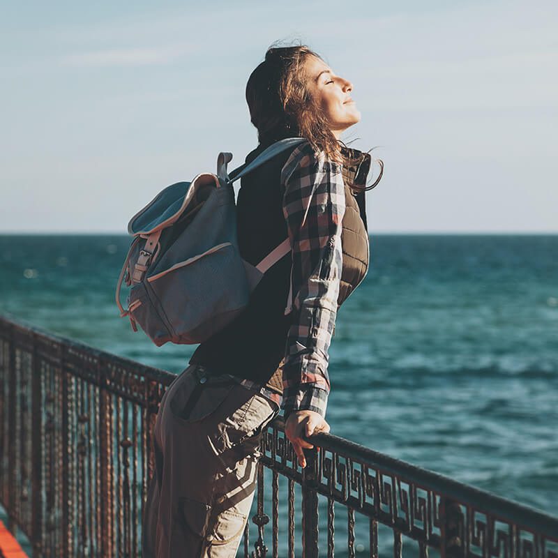 Woman by the ocean
